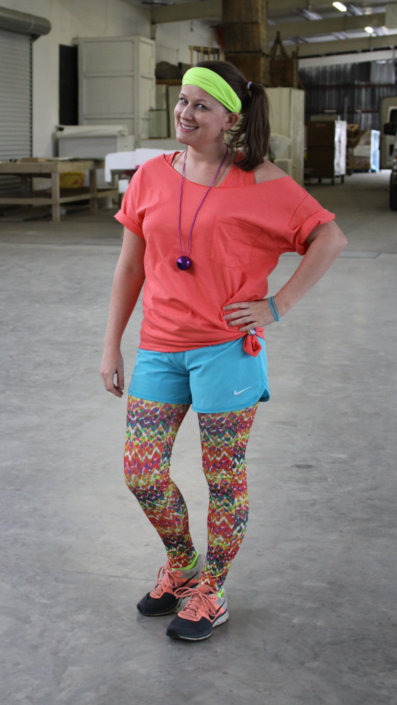 ThemeWorks associate in colorful fitness outfit.