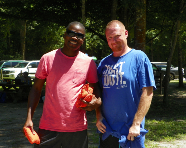 Two ThemeWorks employees smiling.