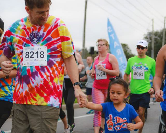 ThemeWorks associates in Tie-dye at a run event.